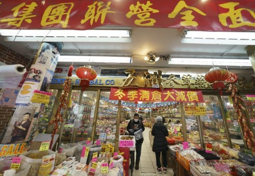 The latest census figures show a record high number of people in Canada now have a mother tongue other than French or English. People shop in Chinatown in Vancouver, Friday, February 5, 2021. THE CANADIAN PRESS/Jonathan Hayward