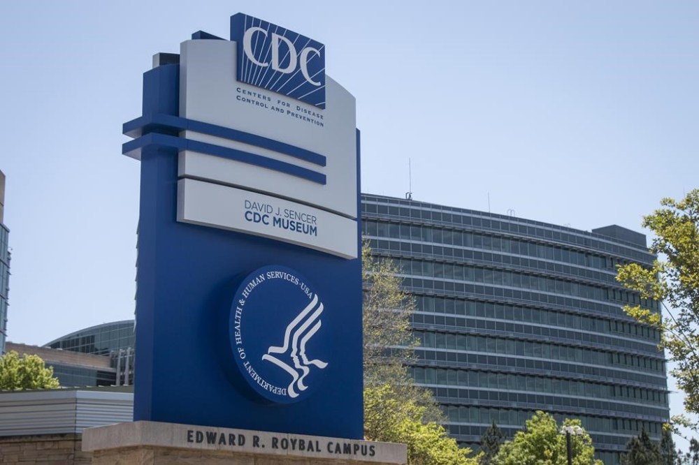 FILE - A Centers for Disease Control and Prevention sign stands at the entrance of their offices in Atlanta on Tuesday, April 19, 2022. On Wednesday, Aug. 17, 2022, the head of nation's top public health agency announced a shake-up of the organization, in a bid to respond to ongoing criticism and try to make it more nimble. (AP Photo/Ron Harris, File)