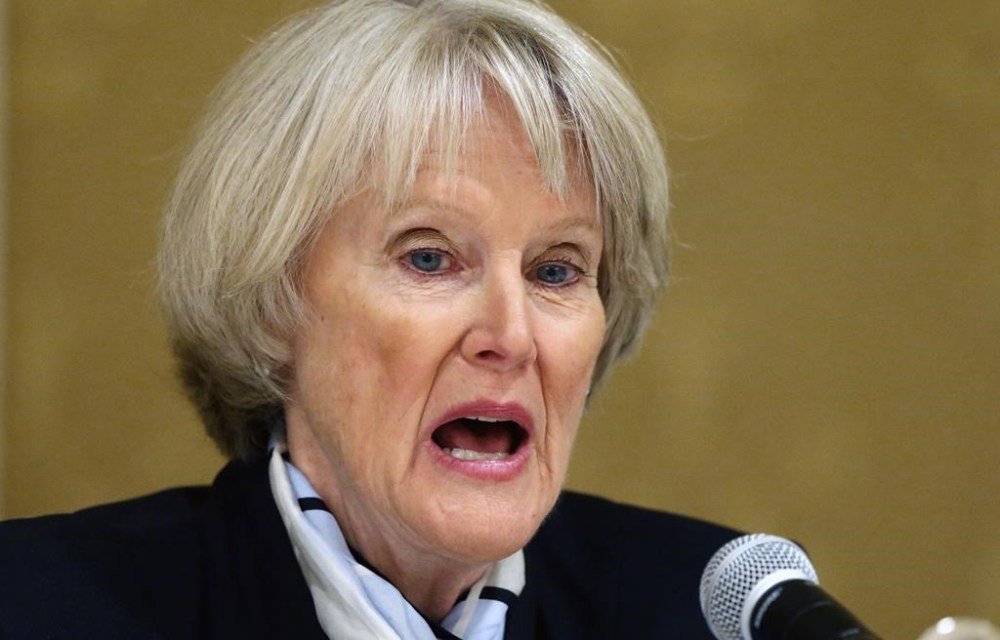 FILE - Denver District Attorney Beth McCann speaks during a discussion in Salt Lake City on Sept. 27, 2018 Denver's top prosecutor says she is opening a grand jury investigation into the actions of three police officers who wounded six bystanders last month while shooting at an armed suspect in a crowded downtown Denver nightlife zone. (AP Photo/Rick Bowmer, File)