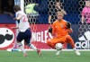 Vancouver Whitecaps' Ryan Gauld, left, scores his second goal of the game against Colorado Rapids goalkeeper William Yarbrough during the first half of an MLS soccer game in Vancouver on Wednesday, August 17, 2022. THE CANADIAN PRESS/Darryl Dyck