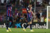 Barcelona's Ousmane Dembele, left and Barcelona's Robert Lewandowski walk off the pitch at the end of a Spanish La Liga soccer match between Barcelona and Rayo Vallecano at the Camp Nou stadium in Barcelona, Spain, Saturday, Aug. 13, 2022. (AP Photo/Joan Monfort)
