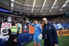 Vancouver Whitecaps goalkeeper Thomas Hasal leaves the field with an injury as Dr. Dory Boyer supports his hand with a towel during the second half of an MLS soccer game against Toronto FC in Vancouver, B.C., Sunday, May 8, 2022. THE CANADIAN PRESS/Darryl Dyck
