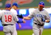 FILE - Chicago Cubs Mark DeRosa, right, is congratulated by third base coach Mike Quade, left, after hitting a two-run home run against the Milwaukee Brewers in the first inning of a baseball game Friday April 6, 2007, in Milwaukee. Former major leaguer Mark DeRosa has been named Team USA manager for the 2023 World Baseball Classic. USA Baseball, based in Cary, North Carolina, announced the appointment Friday, Aug. 19, 2022. (AP Photo/Darren Hauck, File)