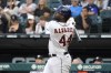 Houston Astros' Yordan Alvarez watches his sacrifice fly off Chicago White Sox starting pitcher Johnny Cueto during the first inning of a baseball game Monday, Aug. 15, 2022, in Chicago. (AP Photo/Charles Rex Arbogast)