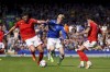 Nottingham Forest's Scott McKenna, left, and Neco Williams challenge Everton's Anthony Gordon for the ball during the English Premier League soccer match between Everton and Nottingham Forest at Goodison Park, Liverpool, England, Saturday Aug. 20, 2022. (Peter Byrne/PA via AP)
