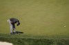 Collin Morikawa reacts to his putt on the 17th hole during the third round of the BMW Championship golf tournament at Wilmington Country Club, Saturday, Aug. 20, 2022, in Wilmington, Del. (AP Photo/Julio Cortez)
