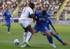 Empoli's Gabriel Marin, right, and Fiorentina's Jonath Ikone battle for the ball during the Italian Serie A soccer match between Empoli and Fiorentina at the Castellani Stadium in Empoli, Italy, Sunday, Aug. 21 2022. (Marco Bucco/LaPresse via AP)
