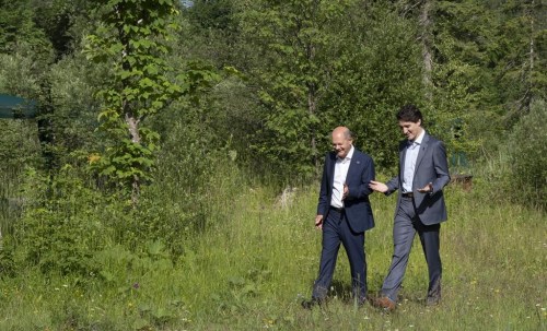 Prime Minister Justin Trudeau and Olaf Scholz, Chancellor of Germany take a stroll at the G7 Summit in Schloss Elmau on June 27, 2022. Prime Minister Justin Trudeau and German Chancellor Olaf Scholz plan to attend a networking luncheon in Montreal today with German and Canadian business representatives. Trudeau's office says the leaders hope to encourage investment and partnership opportunities, including in the critical minerals and automotive sectors. The leaders then plan to tour a national artificial intelligence institute funded by the federal government. THE CANADIAN PRESS/Paul Chiasson