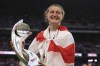 FILE - England's Ellen White poses with the trophy yhe Women's Euro 2022 final soccer match between England and Germany at Wembley stadium in London, Sunday, July 31, 2022. White announced her retirement from soccer Monday, Aug. 22, 2022, after saying her “dreams came true” when the Lionesses won the Women's European Championship last month. (AP Photo/Leila Coker, File)