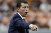 FILE — Houston Dynamo head coach Tab Ramos gestures during the second half of an MLS soccer match against FC Cincinnati, July 3, 2021, in Houston. Former U.S. national team star Tab Ramos was hired Monday, Aug. 22, 2022, as coach of the Hartford Athletic in the second tier United Soccer League Championship. (AP Photo/Michael Wyke, File)