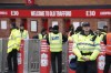 Police officers stand guard before the English Premier League soccer match against Liverpool at Old Trafford stadium in Manchester, England, Monday, Aug 22, 2022. (AP Photo/Dave Dave Thompson)
