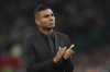 Manchester United's new player Casemiro applauds supporters prior to the start of the English Premier League soccer match between Manchester United and Liverpool at Old Trafford stadium, in Manchester, England, Monday, Aug 22, 2022. (AP Photo/Dave Thompson)