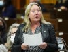 President of the Treasury Board Mona Fortier stands during question period in the House of Commons on Parliament Hill in Ottawa on March 28, 2022. The federal Treasury Board says it has no plans to expand a bonus paid to employees who are bilingual in English and French, to those who speak an Indigenous language. THE CANADIAN PRESS/Sean Kilpatrick