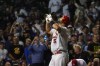 St. Louis Cardinals' Albert Pujols celebrates his 693rd career home run off Chicago Cubs starting pitcher Drew Smyly during the seventh inning of a baseball game Monday, Aug. 22, 2022, in Chicago. (AP Photo/Charles Rex Arbogast)