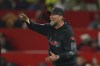 Liverpool's manager Jurgen Klopp gestures during the English Premier League soccer match between Manchester United and Liverpool at Old Trafford stadium, in Manchester, England, Monday, Aug 22, 2022. (AP Photo/Dave Thompson)