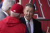 FILE - Los Angeles Angels owner Arte Moreno, right, talks with Angels manager Joe Maddon prior to a baseball game against the Cleveland Guardians on Tuesday, April 26, 2022, in Anaheim, Calif. Moreno says he is exploring the possibility of selling the franchise. (AP Photo/Mark J. Terrill, File)