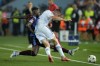 Trabzonspor's Stefano Denswil, left, and Copenhagen's Lukas Lerager fight for the ball during the Champions League play-off, second leg soccer match, between Trabzonspor and FC Copenhagen at the Senol Gunes stadium in Trabzon, Turkey, Wednesday, Aug. 24, 2022. (AP Photo/Francisco Seco)