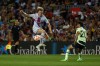 Barcelona's Frenkie de Jong, left, controls the ball in front Manchester City's Bernardo Silva during a charity friendly soccer match between Barcelona and Manchester City at the Camp Nou stadium in Barcelona, Spain, Wednesday, Aug. 24, 2022. (AP Photo/Joan Monfort)
