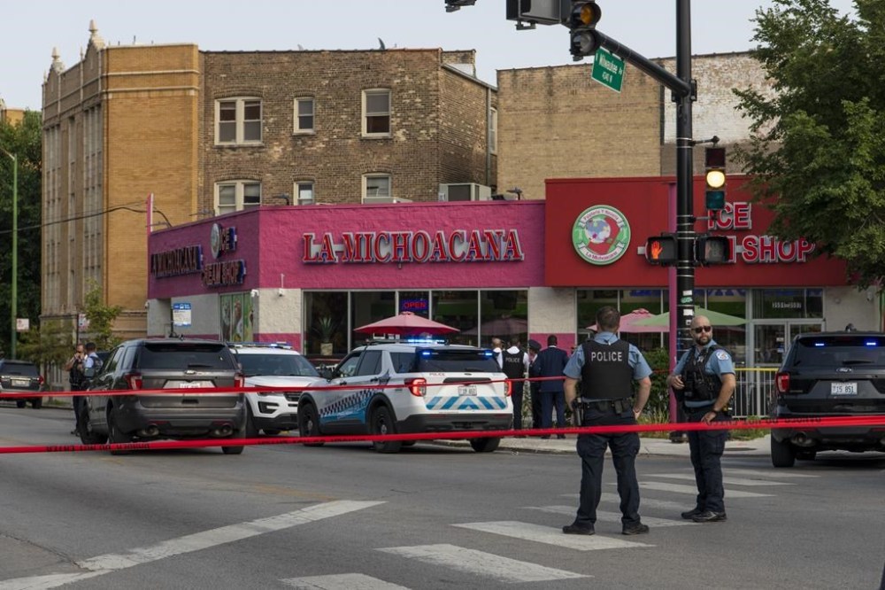 4 injured in drive-by shooting near Chicago high school – Winnipeg Free ...