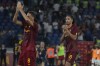 Roma's Chris Smalling, right, applauds after the Italian Serie A soccer match between Roma and Cremonese at the Olympic Stadium in Rome, Italy, Monday, Aug. 22, 2022. Roma won 1-0. (AP Photo/Gregorio Borgia)