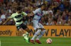 Barcelona's Pierre-Emerick Aubameyang, right, is challenged by Manchester City's Bernardo Silva during a charity friendly soccer match between Barcelona and Manchester City at the Camp Nou stadium in Barcelona, Spain, Wednesday, Aug. 24, 2022. (AP Photo/Joan Monfort)