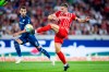 Freiburg's Christian Guenter, right, and Bochum's Erhan Masovic challenge for the ball during the German Bundesliga soccer match between SC Freiburg and VfL Bochum in Freiburg, Germany, Friday, Aug. 26, 2022. Tom Weller/dpa via AP)