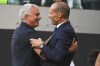 Juventus coach Massimiliano Allegri embraces Roma coach Jose Mourinho prior to the Italian Serie A soccer match between Juventus and Roma at the Juventus stadium in Turin, Italy, Saturday, Aug. 27, 2022. (Marco Alpozzi/LaPresse via AP)
