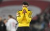 FILE - Dortmund's Giovanni Reyna reacts disappointed after the German Bundesliga soccer match between 1.FC Cologne and Borussia Dortmund in Cologne, Germany, on March 20, 2022. Borussia Dortmund is not taking any chances with Reyna. The American midfielder was surprisingly left out of Dortmund’s squad for its 1-0 win at Hertha Berlin on Saturday Aug. 27, 2022 despite making his long-awaited return from injury the week before. (AP Photo/Martin Meissner, File)