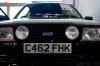 The Ford Escort RS Turbo Series 1, that belonged to the late Diana, Princess of Wales, is seen during a preview of an auction at Silverstone circuit, in Northamptonshire, England, Friday, Aug. 26, 2022. The Ford Escort RS Turbo was driven by Diana, Princess of Wales from 1985 until 1988 and goes on auction for the first time, on the year that marks the 25th anniversary of her death, on Aug. 31, 1997. (AP Photo/Alberto Pezzali)