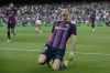 Barcelona's Robert Lewandowski celebrates after scoring his side's opening goal during a Spanish La Liga soccer match between FC Barcelona and Valladolid CF at the Camp Nou stadium in Barcelona, Spain, Sunday, Aug. 28, 2022. (AP Photo/Joan Monfort)