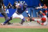 Los Angeles Angels second baseman David Fletcher (22) slides past Toronto Blue Jays catcher Danny Jansen (9) to score during seventh inning MLB baseball action, in Toronto on Sunday, August 28, 2022. THE CANADIAN PRESS/Christopher Katsarov