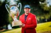 Winner Thriston Lawrence of South Africa celebrates his victory with the trophy after the fourth and final round of the Omega European Masters Golf Tournament in Crans-Montana, Switzerland, Sunday, Aug. 28, 2022. (/Keystone via AP)