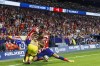 Villarreal's Gerard Moreno, centre falls between Atletico's Correa y Carrasco during a Spanish La Liga soccer match between Atletico Madrid and Villarreal at the Metropolitano stadium in Madrid, Spain, Sunday, Aug. 21, 2022. (AP Photo/Pablo Garcia)