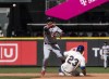 Cleveland Guardians third baseman Jose Ramirez attempts to turn a double play after forcing out Seattle Mariners' Ty France at second base during the fifth inning of a baseball game, Sunday, Aug. 28, 2022, in Seattle. (AP Photo/Stephen Brashear)
