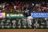 Atlanta Braves' Dansby Swanson celebrates as he rounds the bases after hitting a three-run home run during the seventh inning of a baseball game against the St. Louis Cardinals Sunday, Aug. 28, 2022, in St. Louis. (AP Photo/Jeff Roberson)