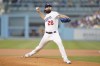 Los Angeles Dodgers starting pitcher Tony Gonsolin (26) throws during the first inning of a baseball game against the Milwaukee Brewers in Los Angeles, Tuesday, Aug. 23, 2022. (AP Photo/Ashley Landis)