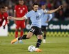 FILE - Uruguay's Edinson Cavani (21) kicks a penalty shot and scores during a friendly soccer match against Panama at Centenario Stadium in Montevideo, Uruguay, June 11, 2022. Valencia said Monday, Aug. 29, 2022, it signed veteran Uruguay striker Cavani on a two-year contract. (AP Photo/Matilde Campodonico, File)
