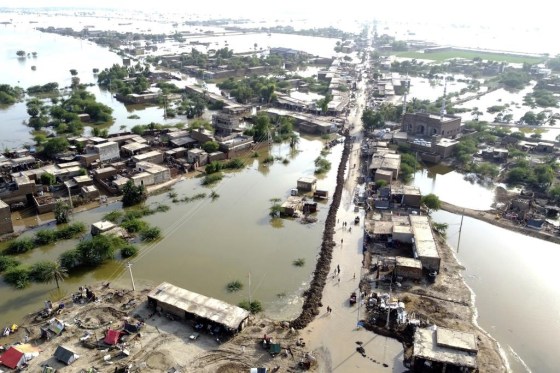 Homes are surrounded by floodwaters in Sohbat Pur city of Jaffarabad, a district of Pakistan's southwestern Baluchistan province, Monday, Aug. 29, 2022. The flooding has all the hallmarks of a catastrophe juiced by climate change, but it is too early to formally assign blame to global warming, several scientists tell The Associated Press. (AP Photo/Zahid Hussain)