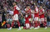 Arsenal players celebrate their victory in the English Premier League soccer match between Arsenal and Fulham at the Emirates Stadium, London, England, Saturday, Aug. 27, 2022. (AP Photo/Alberto Pezzali)
