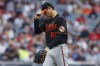 Baltimore Orioles starting pitcher Spenser Watkins walks to the dugout after being removed during the fifth inning of the team's baseball game against the Cleveland Guardians on Tuesday, Aug. 30, 2022, in Cleveland. (AP Photo/Ron Schwane)