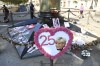 A poster sits by to the unofficial shrine to Princess Diana, Wednesday, Aug. 31, 2022 in Paris to mark the 25th anniversary of Princess Diana's death in a Paris car crash. (AP Photo/Aurelien Morissard)