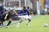 Lazio's Adam Marusic, left, and Sampdoria's Mehdi Léris fight for the ball during the Italian Serie A soccer match between Lazio and Sampdoria at the Luigi Ferraris Stadium in Genoa, Italy, Wednesday Aug. 31, 2022. (Tano Pecoraro/LaPresse via AP)