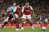Arsenal's Bukayo Saka, second from right, controls the ball during the English Premier League soccer match between Arsenal and Aston Villa at the Emirates Stadium in London, Wednesday, Aug. 31, 2022. (AP Photo/David Cliff)