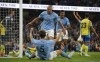 Manchester City's Erling Haaland, centre, celebrates after scoring his side's third goal during the English Premier League soccer match between Manchester City and Nottingham Forest at Etihad Stadium in Manchester, England, Wednesday, Aug 31, 2022. (AP Photo/Dave Thompson)