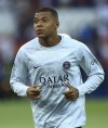 PSG's Kylian Mbappe warms up prior to the French League One soccer match between Paris Saint-Germain and Monaco at the Parc des Princes in Paris, France, Sunday, Aug. 28, 2022. (AP Photo/Aurelien Morissard)