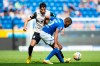 Augsburg's Ricardo Pepi, left, and Hoffenheim's Kevin Akpoguma challenge for the ball during the German Bundesliga soccer match between TSG 1899 Hoffenheim and FC Augsburg in Sinsheim, Germany, Saturday, Aug. 27, 2022. (Tom Weller/dpa via AP)