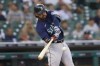 Seattle Mariners' Eugenio Suarez hits a two-run home run against the Detroit Tigers in the first inning of a baseball game in Detroit, Wednesday, Aug. 31, 2022. (AP Photo/Paul Sancya)