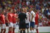 Players argue with the referee during the English Premier League soccer match between Nottingham Forest and Tottenham Hotspur at the City Ground stadium in Nottingham, England, Sunday, Aug. 28, 2022.(AP Photo/Rui Vieira)