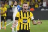 Dortmund's Marco Reus celebrates after scoring the opening goal during the German Bundesliga soccer match between Borussia Dortmund and TSG 1899 Hoffenheim in Dortmund, Germany, Friday, Sept. 2, 2022. (AP Photo/Martin Meissner)