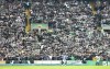 Celtic fans turn their backs as Rangers' Alfredo Morelos runs past during the cinch Premiership match between Celtic and Rangers, at Celtic park, Glasgow, Scotland, Saturday Sept. 3, 2022. (Steve Welsh/PA via AP)